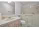 Bathroom with walk-in tub, toilet and vanity at 610 Fannich Ct, Leesburg, FL 34788