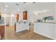 Open concept kitchen with views into living room at 6342 Sanders Grove Cir, Okahumpka, FL 34762