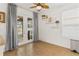 Kitchen nook with access to backyard and ceiling fan at 6342 Sanders Grove Cir, Okahumpka, FL 34762