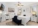Spacious primary bedroom with a king-size bed and plenty of natural light at 6342 Sanders Grove Cir, Okahumpka, FL 34762
