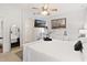 King-size bed, large mirror, and private access to the bathroom at 6342 Sanders Grove Cir, Okahumpka, FL 34762