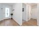 Light and bright entryway with wood flooring at 6764 Mary Loop, The Villages, FL 34762