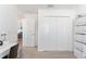 Home office with desk, chair, and closet at 6764 Mary Loop, The Villages, FL 34762