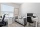 Office space with comfy couch, desk, and window at 6764 Mary Loop, The Villages, FL 34762
