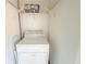 Convenient laundry closet with washer and dryer included at 723 Perkins St # 203, Leesburg, FL 34748