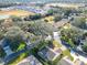 Aerial view of house and surrounding area at 901 Pasadena Way, Lady Lake, FL 32159