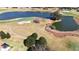 Aerial view of golf course and water features at 9059 Se 177Th Grassmere St, The Villages, FL 32162