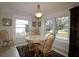 Bright breakfast nook with window views and seating for four at 9059 Se 177Th Grassmere St, The Villages, FL 32162