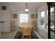 Bright breakfast nook with a round table and chairs at 9059 Se 177Th Grassmere St, The Villages, FL 32162