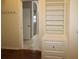 Walk-in closet with built-in shelves and drawers at 9059 Se 177Th Grassmere St, The Villages, FL 32162