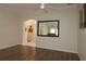 Bright dining room with hardwood floors and view into kitchen at 9059 Se 177Th Grassmere St, The Villages, FL 32162