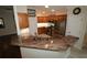Kitchen with granite countertops and wood cabinets at 9059 Se 177Th Grassmere St, The Villages, FL 32162