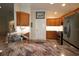 Kitchen with granite countertops and wood cabinets at 9059 Se 177Th Grassmere St, The Villages, FL 32162