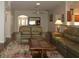 Living room with leather sofas and a wood coffee table at 9059 Se 177Th Grassmere St, The Villages, FL 32162
