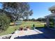Brick paved patio overlooking a golf course at 9059 Se 177Th Grassmere St, The Villages, FL 32162