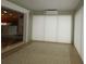 Sunroom with view of kitchen and access to patio at 9059 Se 177Th Grassmere St, The Villages, FL 32162