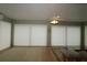 Sunroom with golf course views and large windows at 9059 Se 177Th Grassmere St, The Villages, FL 32162