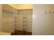 Large walk-in closet with ample shelving and hanging space at 9059 Se 177Th Grassmere St, The Villages, FL 32162