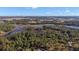 Aerial view showing the property's location and surrounding landscape at Lot 51 Bosmara Dr, Groveland, FL 34736