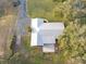 Bird's eye view of the property and surrounding area at 10406 Lakeshore Dr, Clermont, FL 34711