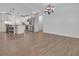 Spacious dining area with wood-look floors at 10406 Lakeshore Dr, Clermont, FL 34711