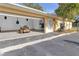 Spacious garage with overhead storage and room for workshop at 10406 Lakeshore Dr, Clermont, FL 34711