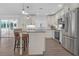 Modern kitchen with granite countertops and a spacious island at 10406 Lakeshore Dr, Clermont, FL 34711