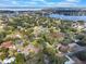 Aerial view of a residential neighborhood near a lake at 10438 Lake Hill Dr, Clermont, FL 34711