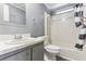 Bathroom with tub, shower, and gray vanity at 11 Orangewood Dr, Fruitland Park, FL 34731