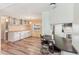 Bright dining area with built-in cabinets and hardwood floors at 11 Orangewood Dr, Fruitland Park, FL 34731