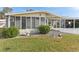 Charming single-story home with a covered carport and a well-maintained front yard at 11 Orangewood Dr, Fruitland Park, FL 34731