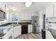 Modern kitchen featuring stainless steel appliances and ample cabinetry at 11 Orangewood Dr, Fruitland Park, FL 34731