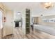 Kitchen features modern appliances and wood flooring at 11 Orangewood Dr, Fruitland Park, FL 34731