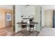 Kitchen with corner sink and dark countertops at 11 Orangewood Dr, Fruitland Park, FL 34731