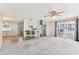 Living area with view of patio and ceiling fan at 11 Orangewood Dr, Fruitland Park, FL 34731