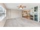 Spacious living room features a ceiling fan and an open floor plan at 11 Orangewood Dr, Fruitland Park, FL 34731