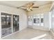 Sunroom with tiled floor and access to the outdoors at 11 Orangewood Dr, Fruitland Park, FL 34731