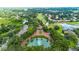 Community overview, featuring homes, golf course, and lake at 1286 Prince Ct, Lake Mary, FL 32746
