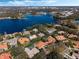 Aerial view of luxury homes and lake at 1286 Prince Ct, Lake Mary, FL 32746