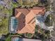 Top-down view of home with tile roof and pool at 1286 Prince Ct, Lake Mary, FL 32746
