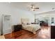 Spacious primary bedroom with hardwood floors and a sitting area at 1286 Prince Ct, Lake Mary, FL 32746