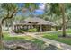 Community clubhouse with lake views and outdoor seating at 1286 Prince Ct, Lake Mary, FL 32746