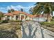 House exterior showcasing a driveway, palm tree, and basketball hoop at 1286 Prince Ct, Lake Mary, FL 32746