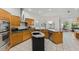Large kitchen with island, stainless steel appliances, and granite counters at 1286 Prince Ct, Lake Mary, FL 32746