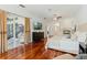 Main bedroom with hardwood floors, fireplace and backyard access at 1286 Prince Ct, Lake Mary, FL 32746