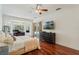 Spacious main bedroom with hardwood floors and access to a balcony at 1286 Prince Ct, Lake Mary, FL 32746