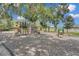 Community playground with slides, climbing structures, and shaded areas at 1286 Prince Ct, Lake Mary, FL 32746
