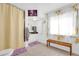Clean bathroom with shower, bathtub and storage at 1412 N Garfield Ave, Deland, FL 32724