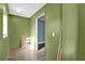 Small office or den with a chair and open door at 1412 N Garfield Ave, Deland, FL 32724