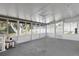 Large screened porch with grey floor at 1412 N Garfield Ave, Deland, FL 32724